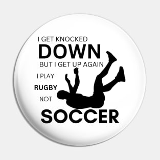 Rugby Players Fall Down Pin