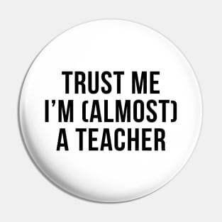 Trust me I'm (almost) a teacher. In black. Pin