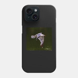 A Gull Flying Over a Lake Phone Case