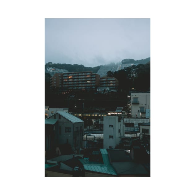 Ito at Dusk with cloud filled mountains in the background by TokyoLuv