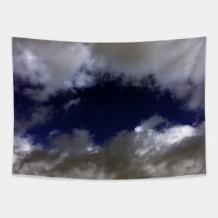 Fluffy Clouds Outlying the Blue Sky Tapestry