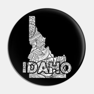 Mandala art map of Idaho with text in white Pin