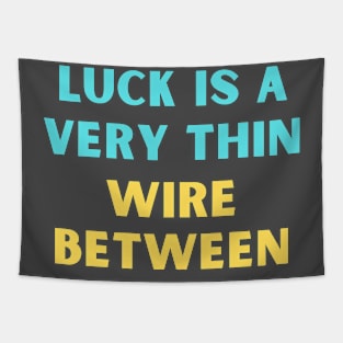 Luck is a very thin wire between Tapestry