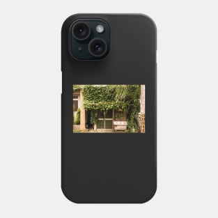 Unique street photography of Reclaimed by nature Phone Case