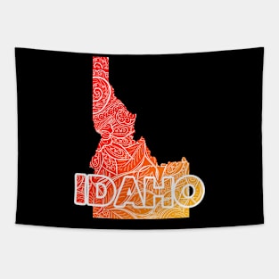 Colorful mandala art map of Idaho with text in red and orange Tapestry