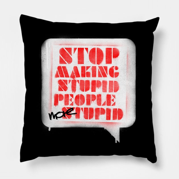 Stop making stupid people more stupid Pillow by opippi