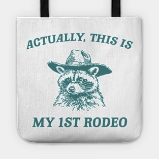 Raccoon Actually This Is My First Rodeo Shirt, Funny Trash Panda Meme Tote