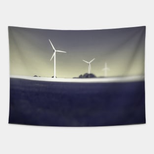 Black and white photo with scenic view of three power windmill turbines on clear sky and rye crop with half sun shadow Tapestry