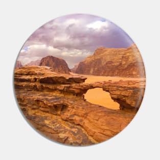 Rock formation with natural arch in the Wadi Rum desert, Jordan Pin