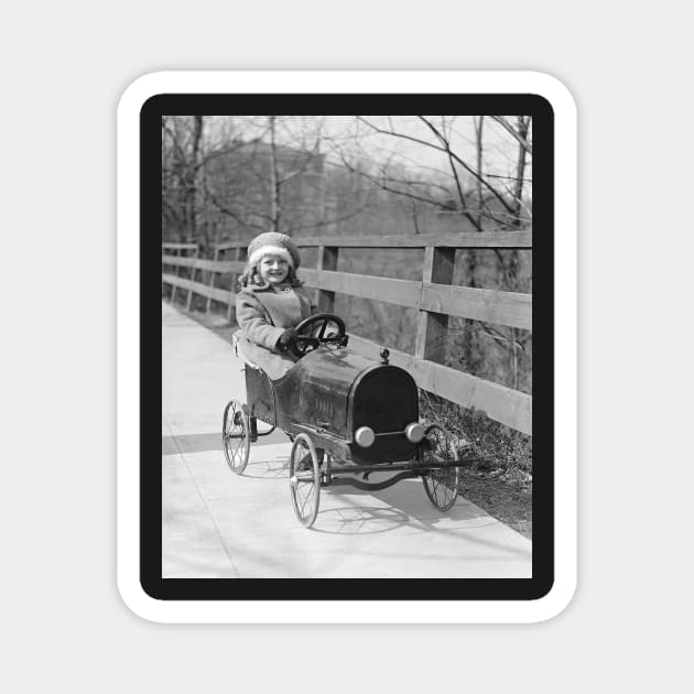 Little Girl Driving Pedal Car, 1922. Vintage Photo Magnet by historyphoto