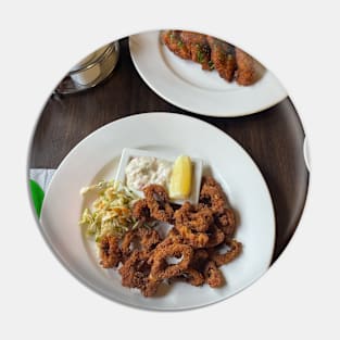 a plate of calamari and barbecue wings Pin