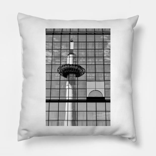 Reflection of the Kyoto Tower on the glass facade of the Kyoto station Pillow by Offiinhoki