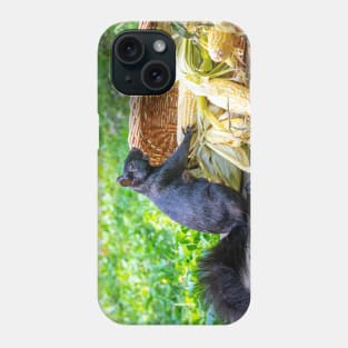 Squirrel is happy to find a basket of corn on the cob Phone Case