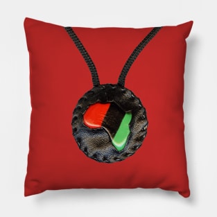 Protected by the Red, The Black, and The Green Pillow