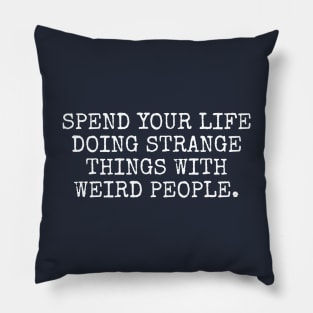 Spend your life doing strange things Pillow
