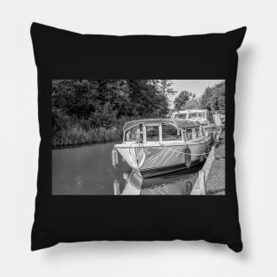 Front on view of holiday boat moored up on the Norfolk Broads Pillow