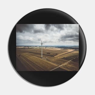 Aerial view of windmill against cloudy sky Pin