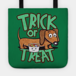 Funny and cute doxie dachshund dog going trick or treating on halloween to get more candy on a scary and spooky night Tote