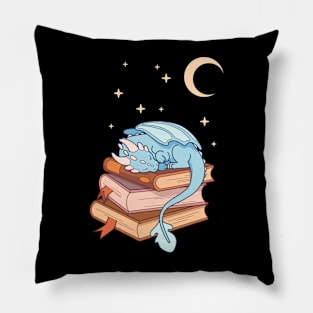 Little blue dragon sleeping on a stack of books Pillow