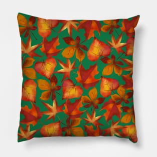 Autumn leaves on green background Pillow