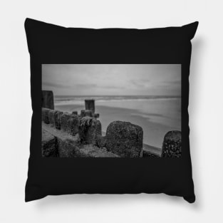 Close up of wooden sea defences protecting against coastal erosion Pillow