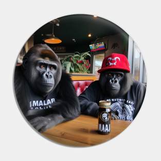 two gorillas enjoying beer in bar Pin