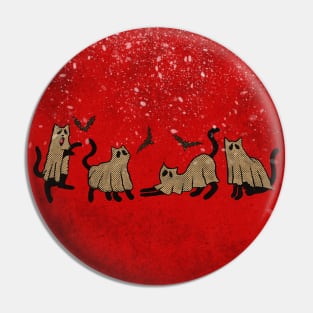 cat horror in carpet red in snow Pin