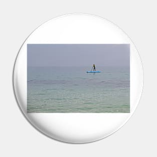 Paddle boarder in the sea off the Isle of Herm, Channel Islands Pin