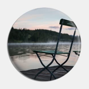 Two Chairs on pier. Amazing shot of the Ferchensee lake in Bavaria, Germany. Scenic foggy morning scenery at sunrise. Pin