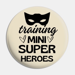 Training Mini Super Heroes Pin