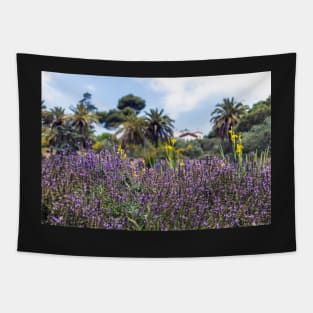 Lush purple sage flowers with palms in the background Tapestry