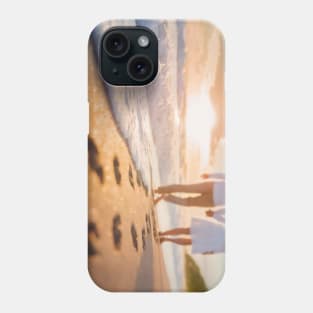 Handheld couple walking on the beach Phone Case