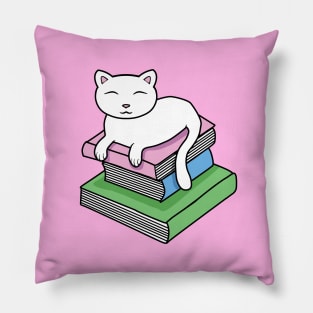 Cat resting on a pile of books Pillow