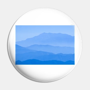 Blue mountain landscape backdrop in tiered tones of blue Pin