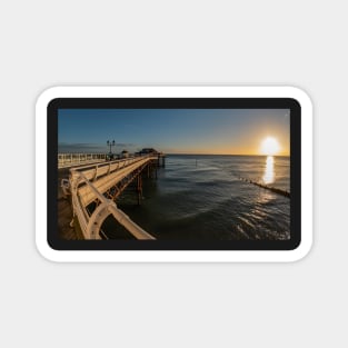 Fisheye view along Cromer Pier at sunrise Magnet