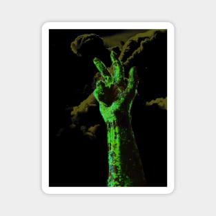Digital collage and special processing. Hand near clouds. Holy trinity hand gesture. Very strange, green. Bizarre. Zombie. Magnet