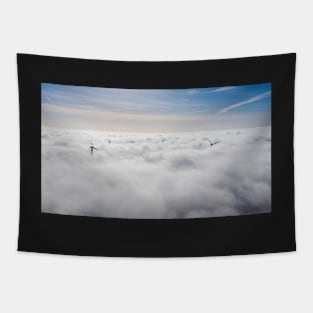 Wind farms sticking out above the clouds Tapestry