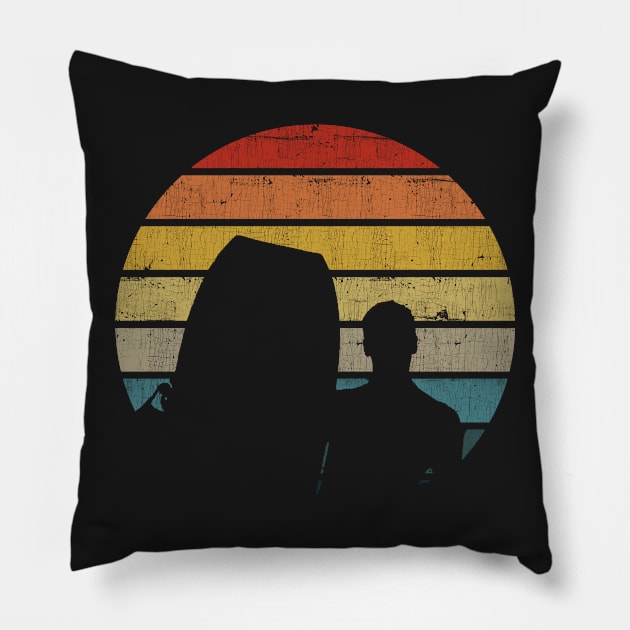 Bodyboarding Surfer Silhouette On A Distressed Retro Sunset graphic Pillow by theodoros20