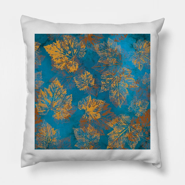 Yellow fall leaves imprints on vibrant blue background. Gold Maple leaves. Golden autumn pattern. Pillow by likapix