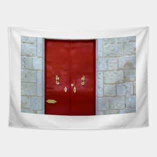 Red wooden door with golden vintage knockers Tapestry