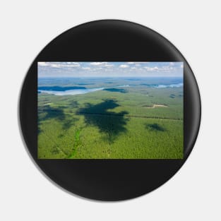 Aerial view of large forest area and distant lake Biale Augustowskie Pin