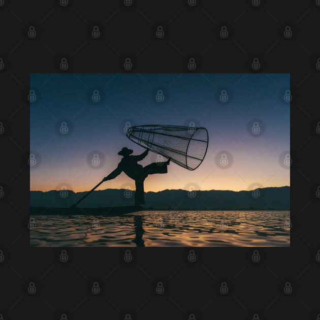 Silhouette of Traditional Fisherman on Lake Inle, Myanmar by visualspectrum