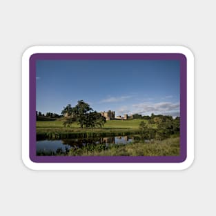 Alnwick Castle reflected in the River Aln Magnet