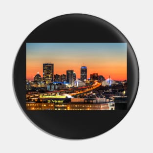 The Boston Skyline lit up blue at Sunset Pin