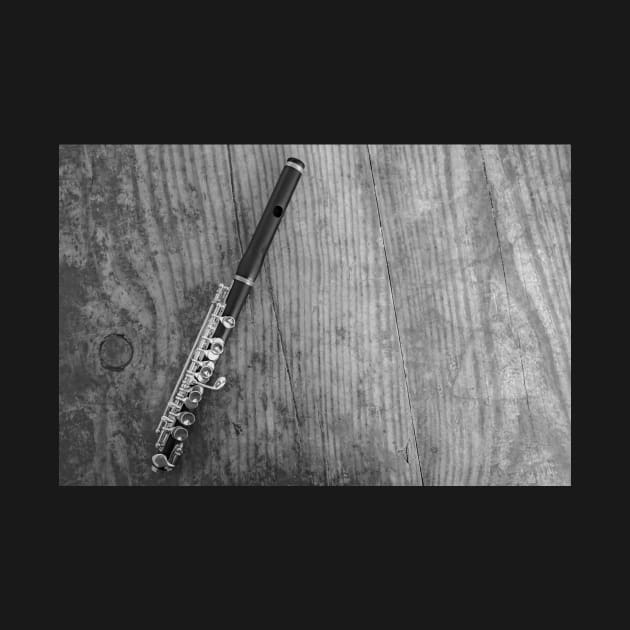 Top down view of wooden flute on wooden table by yackers1