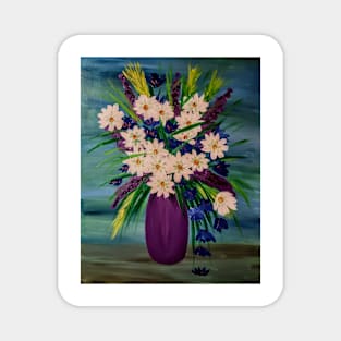 A lovely mixed of colorful flowers in a metallic purple vase Magnet