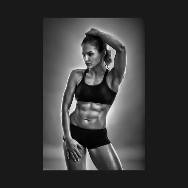 Fitness woman posing in studio by naturalis