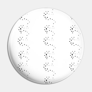 Black dots on a white surface, abstraction Pin