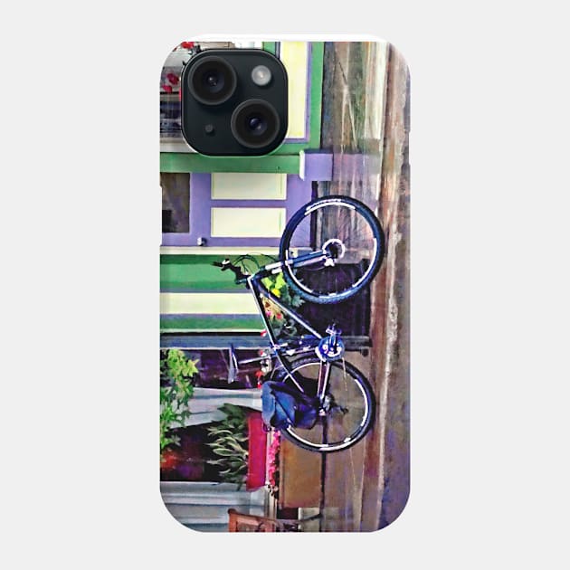 Owego NY - Bicycle Parked on Rainy Street Phone Case by SusanSavad