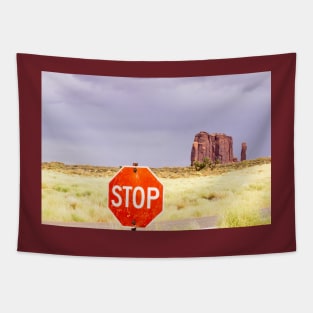 Stop sign in approach road to Monument Valley Tapestry